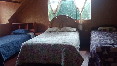 Postel nebo postele na pokoji v ubytování Ghhhh