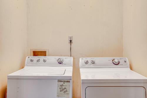 a kitchen with two white ovens in a room at 6 Mi to Scottsboro Pet-Friendly Cabin Apt in Hollywood