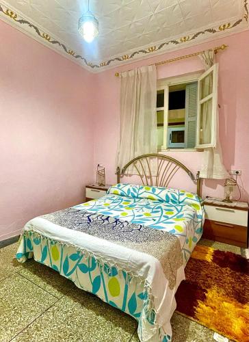 Postel nebo postele na pokoji v ubytování La casita de Larache