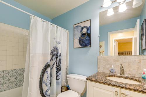 a bathroom with a shower and a toilet and a sink at Mins to the Coast Port St Lucie Home with Lanai! in Fort Pierce