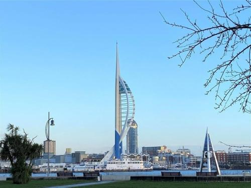 a view of a city with a ferris wheel at Cosy 2 bedroom modern flat close to transport link in Gosport