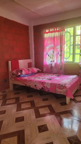 Postel nebo postele na pokoji v ubytování FINCA La CASANOVA