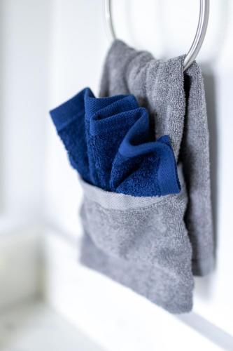a pair of towels hanging on a towel rack at Luxury Downtown Townhome Private Garage Unit 6 in Cleveland