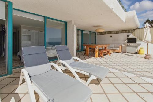 Patio nebo venkovní prostory v ubytování Amplia terraza en primera linea, Playa Amarilla