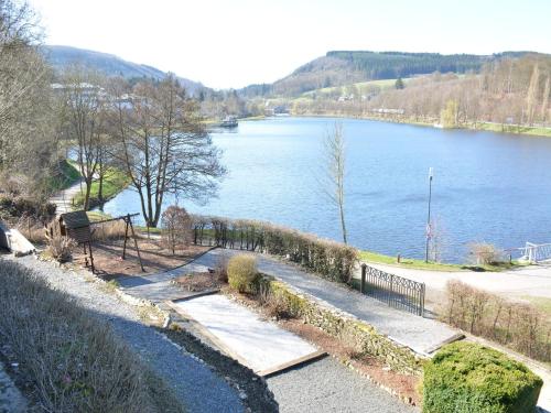 a view of a body of water with a fence at Villa in Vielsalm with Lake Views and Pool in Vielsalm