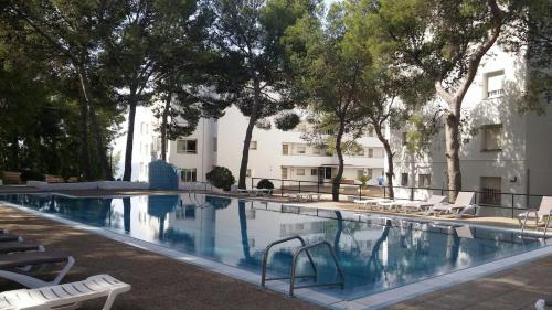 Apartmento en Primera línea de Mar, vistas al Mar y Piscina