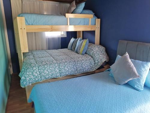 Ένα ή περισσότερα κρεβάτια σε δωμάτιο στο Apartamento Cuadruple