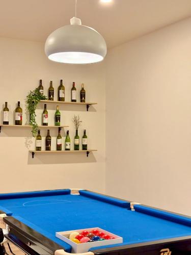 a pool table in a room with bottles at Medina Private Pool Villa-บางแสน in Ban Puk (1)