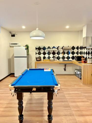 a pool table in the middle of a kitchen at Medina Private Pool Villa-บางแสน in Ban Puk (1)