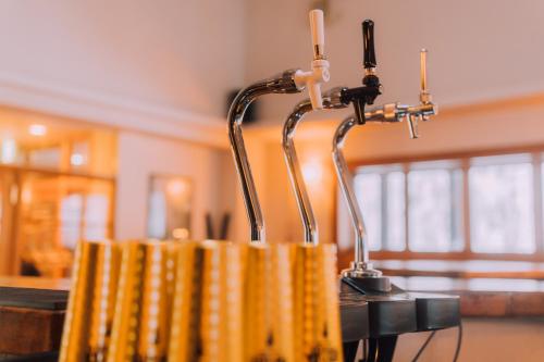 a row of yellow towels sitting on a table at Double Black Hotel in Hakuba