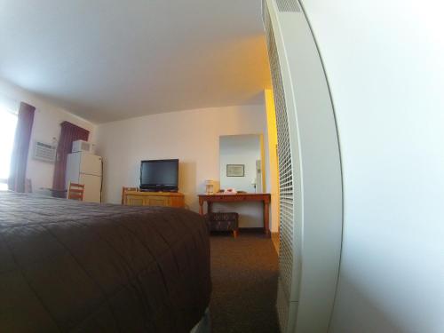 TV a/nebo společenská místnost v ubytování Rycroft Hotel