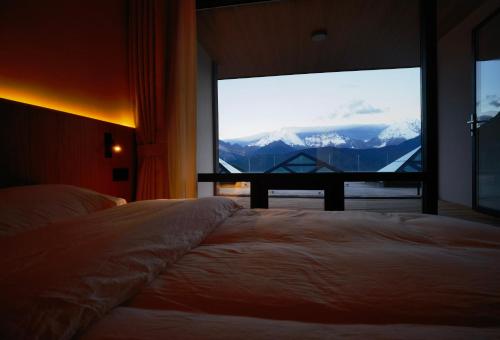 Katil atau katil-katil dalam bilik di Wake Up In Snow Capped Peaks