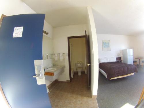 Postel nebo postele na pokoji v ubytování Rycroft Hotel