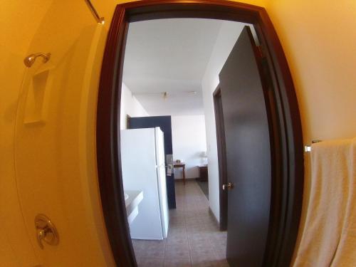 Postel nebo postele na pokoji v ubytování Rycroft Hotel