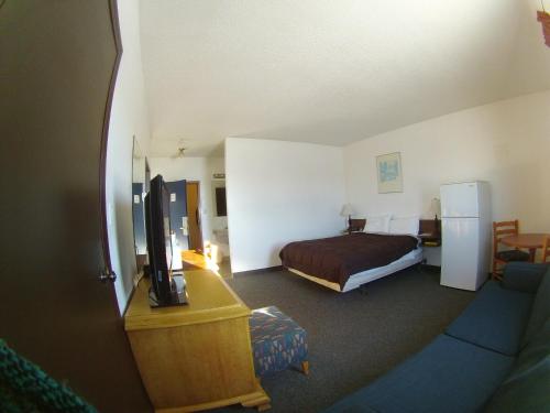 Postel nebo postele na pokoji v ubytování Rycroft Hotel