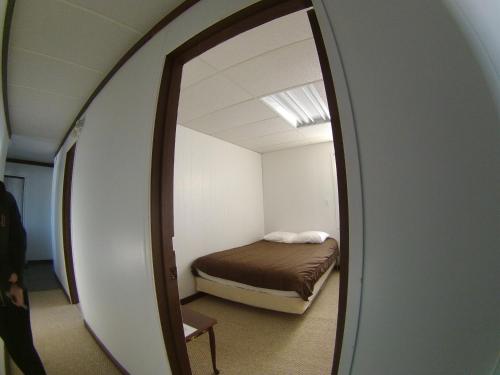 Postel nebo postele na pokoji v ubytování Rycroft Hotel
