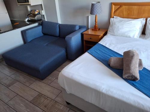 Katil atau katil-katil dalam bilik di Shaka Shores Beach 1 and 2 bedrooms