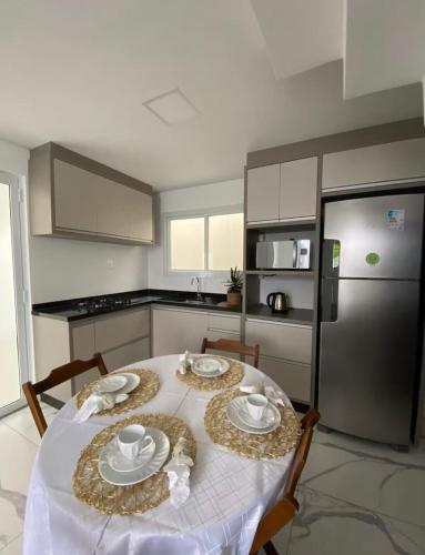 Kuchyň nebo kuchyňský kout v ubytování Apartamento Duplex em Mafra SC