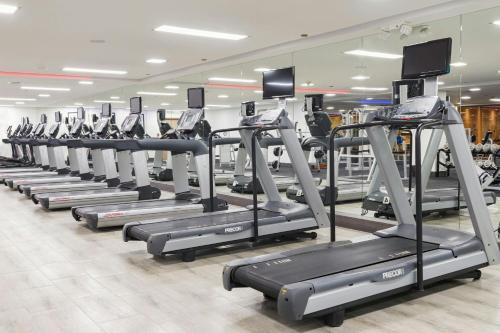 a row of tread machines in a gym at JW Marriott Quito in Quito