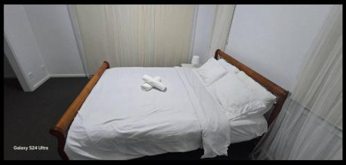 Una cama o camas en una habitación de Serenity Home 9 by Hiverooms