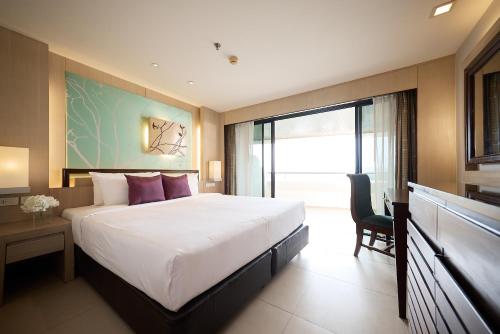Ένα ή περισσότερα κρεβάτια σε δωμάτιο στο Rua Rasada Hotel - The Ideal Venue for Meetings & Events