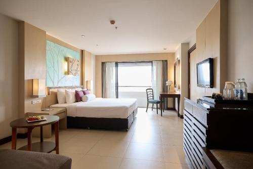 Ένα ή περισσότερα κρεβάτια σε δωμάτιο στο Rua Rasada Hotel - The Ideal Venue for Meetings & Events