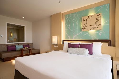 Ένα ή περισσότερα κρεβάτια σε δωμάτιο στο Rua Rasada Hotel - The Ideal Venue for Meetings & Events
