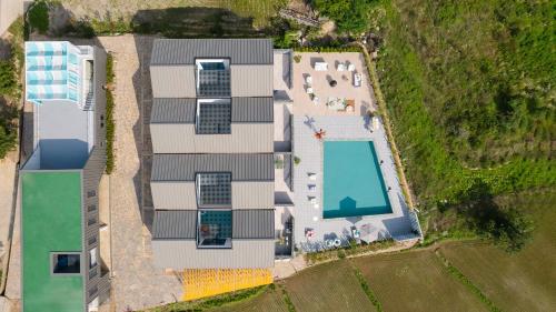 an overhead view of a house with a swimming pool at Le Pavilion Pool Villa in Pohang