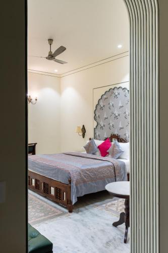 Postel nebo postele na pokoji v ubytování Dera Jaipur Homestay
