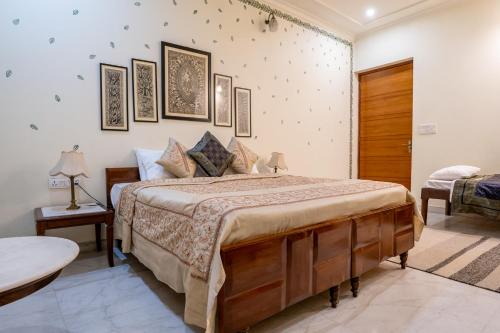 Postel nebo postele na pokoji v ubytování Dera Jaipur Homestay