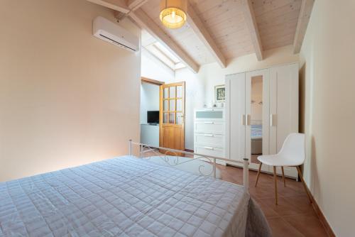 Postel nebo postele na pokoji v ubytování La Nassa