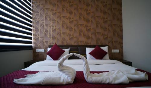 Postel nebo postele na pokoji v ubytování Yuturn Hotel