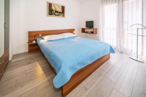 Postel nebo postele na pokoji v ubytování Apartments Magla with Terrace