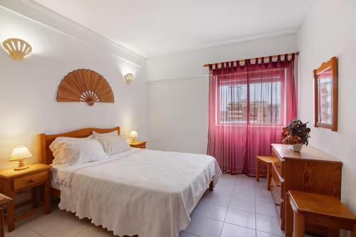 Postel nebo postele na pokoji v ubytování A sua casa no Algarve