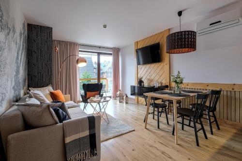 Posezení v ubytování Aparthotel Góralski Spa & Restaurant