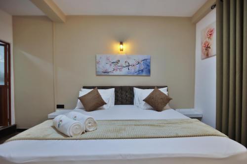 Katil atau katil-katil dalam bilik di Kandy River Lodge