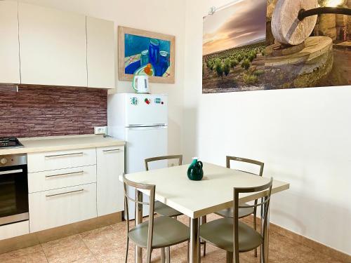 Kuchyň nebo kuchyňský kout v ubytování Casa Orchidea - Torre San Giovanni