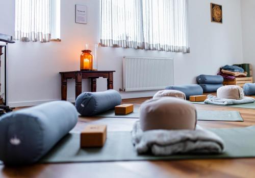 a room with yoga mats on the floor at Eschenhof Bed & Breakfast in Kaprun