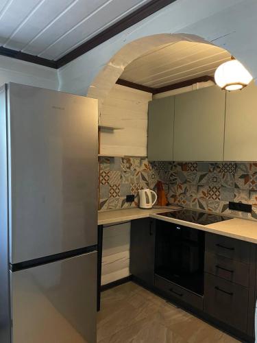 Η κουζίνα ή μικρή κουζίνα στο Gray House