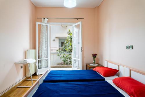 Postel nebo postele na pokoji v ubytování Neos kosmos Filimon