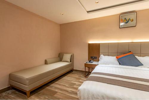Serenity Suitesにあるベッド