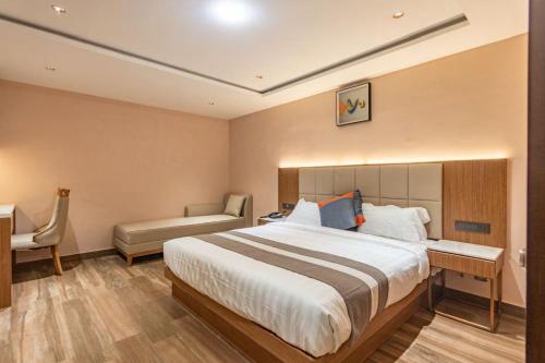 Serenity Suitesにあるベッド