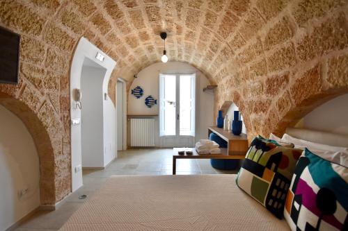 Postel nebo postele na pokoji v ubytování Monachile Suite & Room - Housea