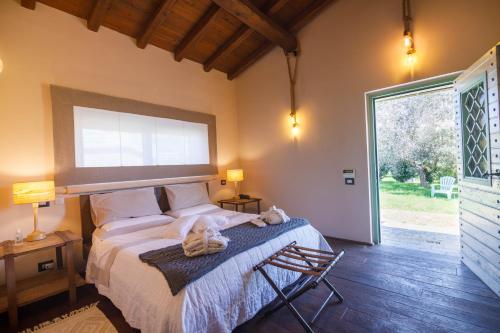 Postel nebo postele na pokoji v ubytování Villa & Spasuitebo Roma