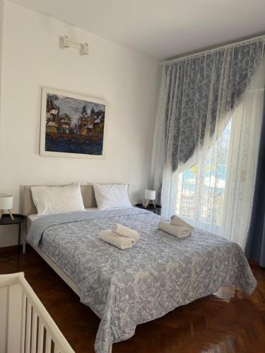 Letto o letti in una camera di Argostoli Turtle Bay Apartment