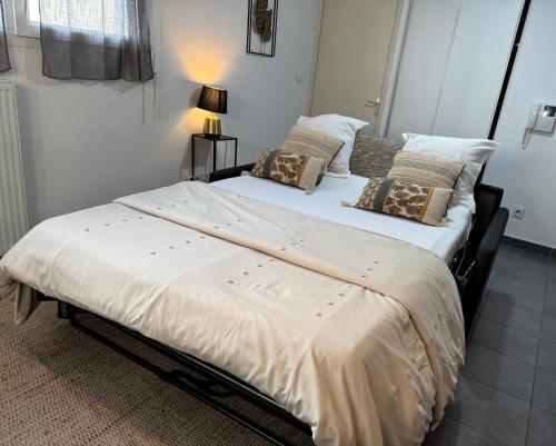 Un ou plusieurs lits dans un hébergement de l'établissement Joli Studio haut standing à 100m du tram T3