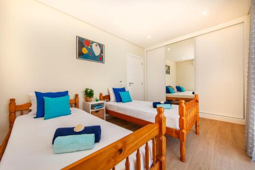 Postel nebo postele na pokoji v ubytování Villa Harmony by Algarve Vacation