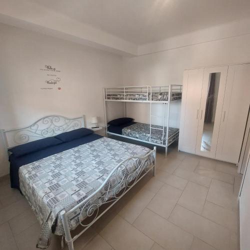 Ένα ή περισσότερα κρεβάτια σε δωμάτιο στο Pretty Home Fiumicino