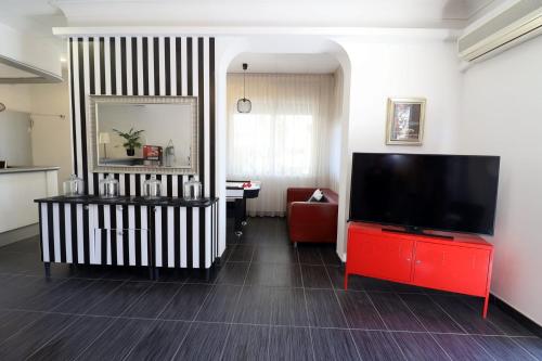 TV a/nebo společenská místnost v ubytování Fasthotel