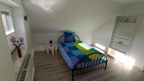 Voodi või voodid majutusasutuse Oldorfer Auszeit toas